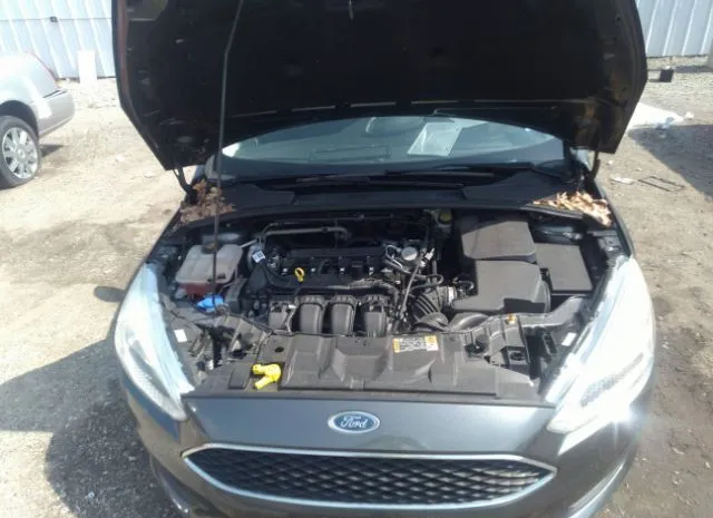 Photo 9 VIN: 1FADP3K24GL351005 - FORD FOCUS 