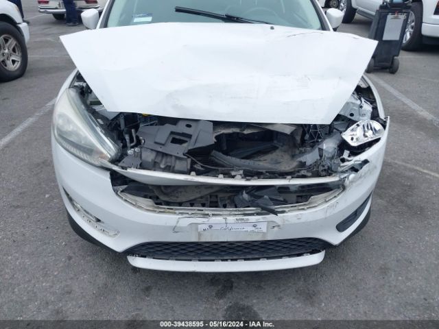 Photo 5 VIN: 1FADP3K24GL372646 - FORD FOCUS 