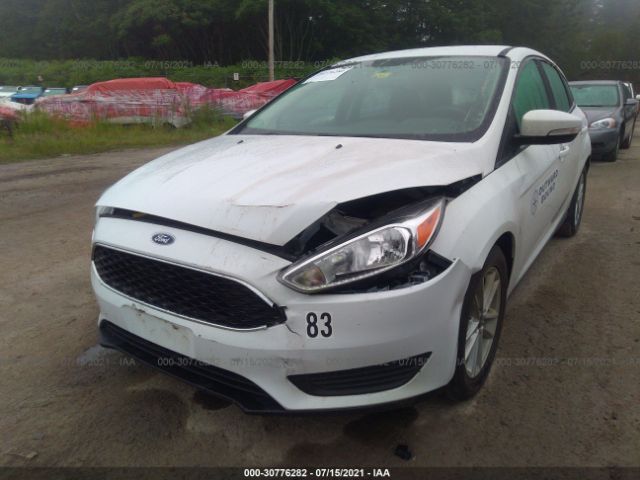 Photo 5 VIN: 1FADP3K24JL225718 - FORD FOCUS 