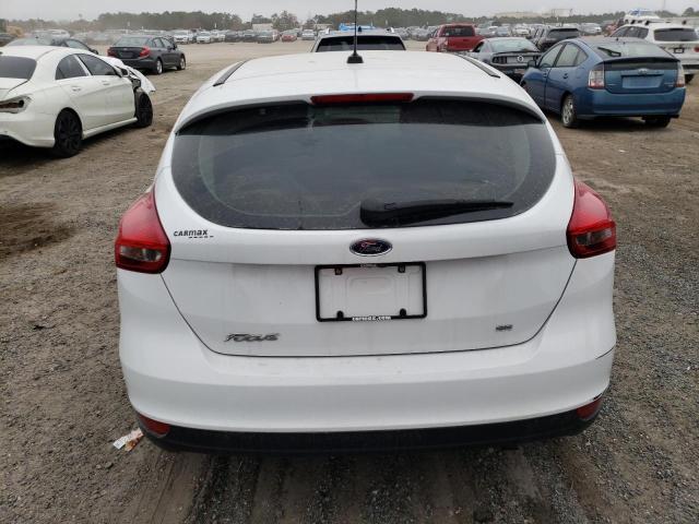 Photo 5 VIN: 1FADP3K24JL332381 - FORD FOCUS SE 