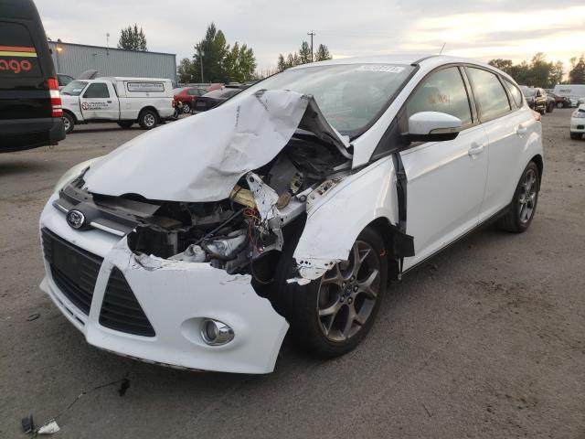 Photo 1 VIN: 1FADP3K25DL139032 - FORD FOCUS SE 