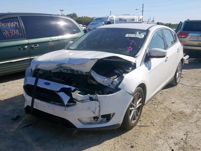 Photo 1 VIN: 1FADP3K25FL234113 - FORD FOCUS SE 