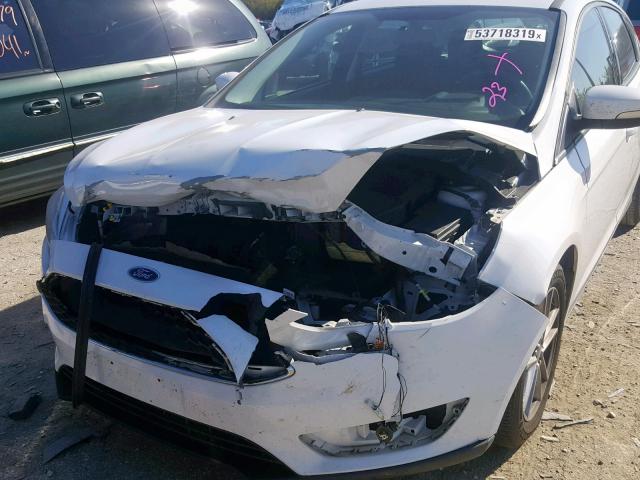 Photo 8 VIN: 1FADP3K25FL234113 - FORD FOCUS SE 