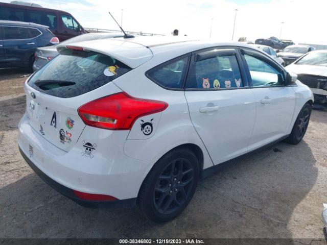 Photo 3 VIN: 1FADP3K25GL215112 - FORD FOCUS 