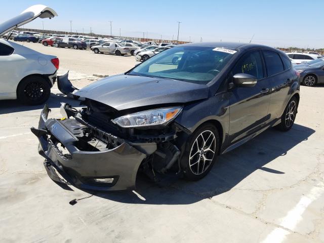 Photo 1 VIN: 1FADP3K25GL216079 - FORD FOCUS SE 