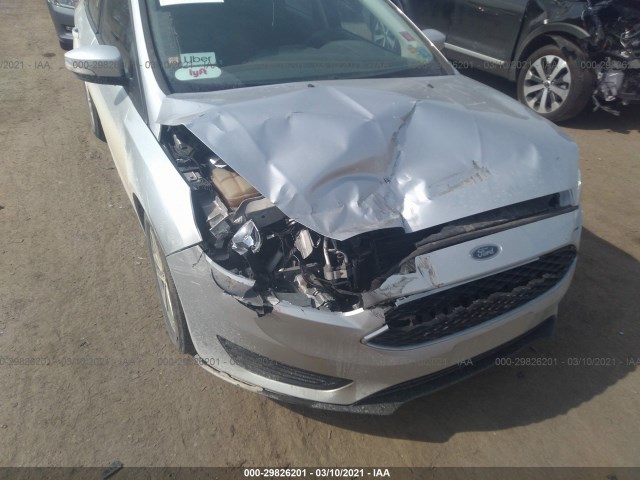 Photo 5 VIN: 1FADP3K25GL293342 - FORD FOCUS 