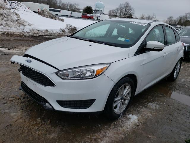 Photo 1 VIN: 1FADP3K25GL300399 - FORD FOCUS SE 