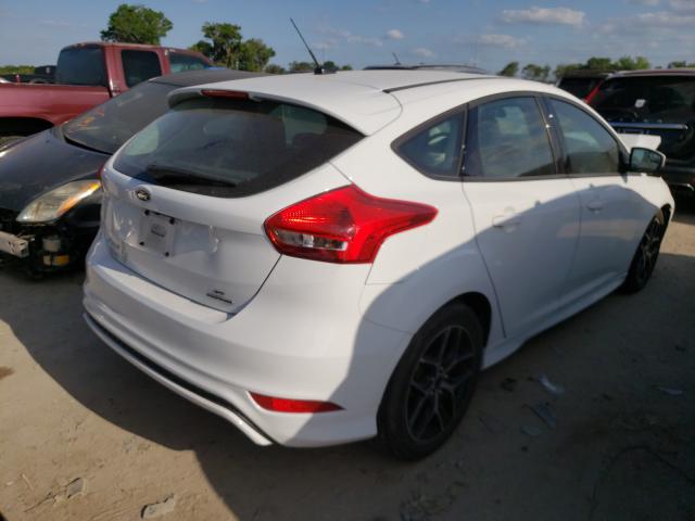 Photo 3 VIN: 1FADP3K25GL313749 - FORD FOCUS 