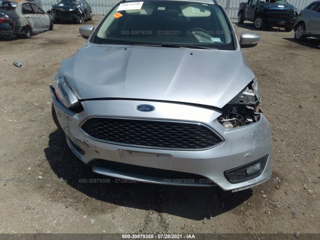 Photo 5 VIN: 1FADP3K25GL360523 - FORD FOCUS 