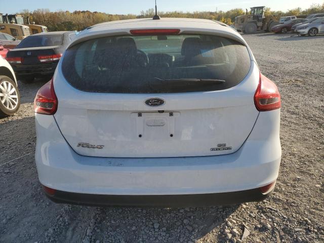 Photo 5 VIN: 1FADP3K25GL369299 - FORD FOCUS SE 