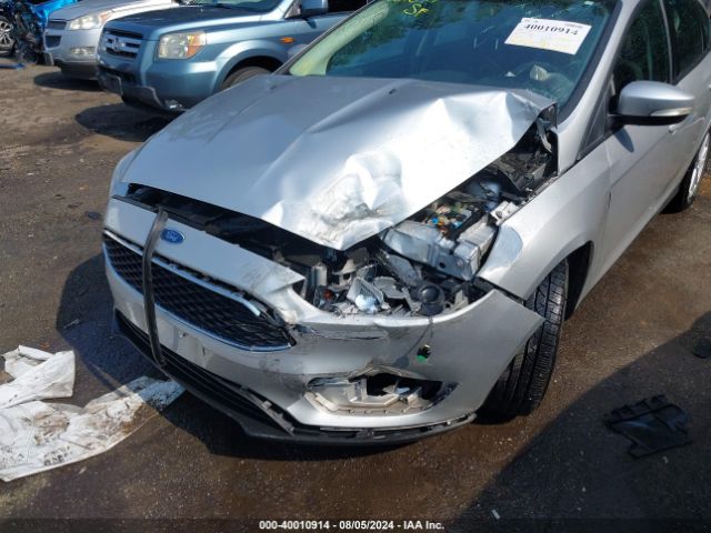 Photo 5 VIN: 1FADP3K25GL386474 - FORD FOCUS 