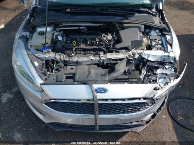 Photo 9 VIN: 1FADP3K25GL386474 - FORD FOCUS 