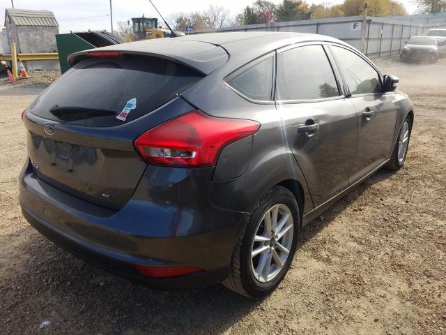 Photo 3 VIN: 1FADP3K25HL230114 - FORD FOCUS 