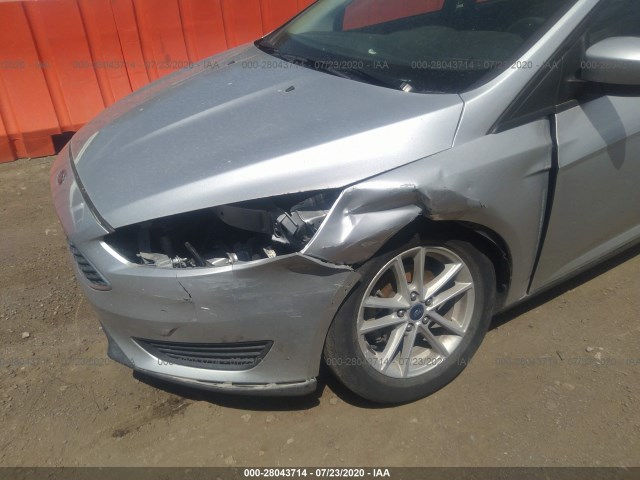 Photo 5 VIN: 1FADP3K25JL207955 - FORD FOCUS 