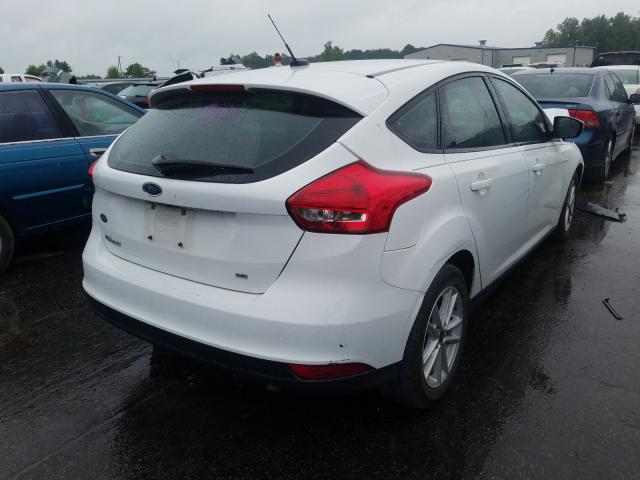 Photo 3 VIN: 1FADP3K25JL208801 - FORD FOCUS SE 