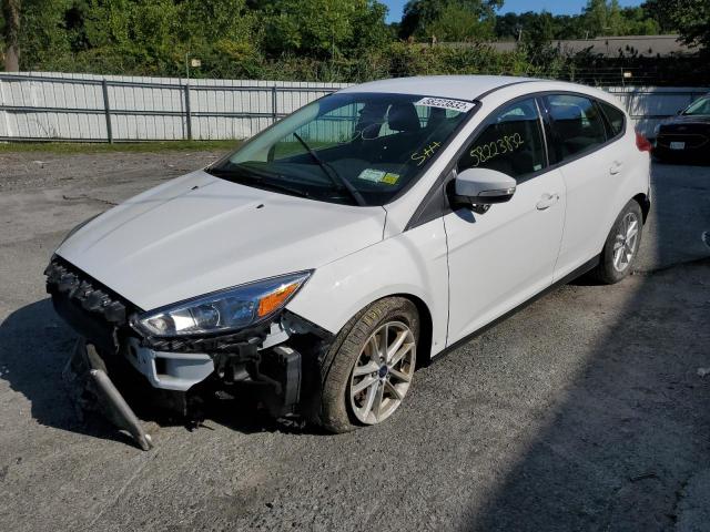 Photo 1 VIN: 1FADP3K25JL306713 - FORD FOCUS SE 