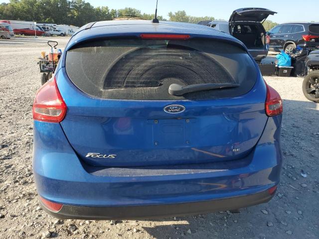 Photo 5 VIN: 1FADP3K25JL315928 - FORD FOCUS SE 