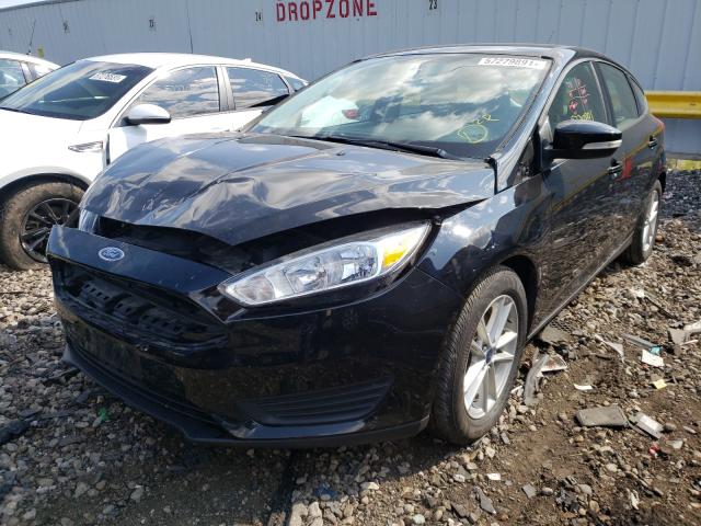 Photo 1 VIN: 1FADP3K25JL331238 - FORD FOCUS SE 