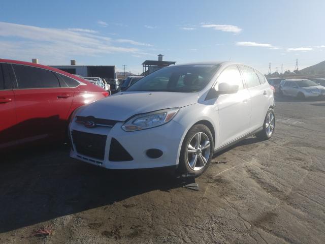 Photo 1 VIN: 1FADP3K26DL302447 - FORD FOCUS SE 