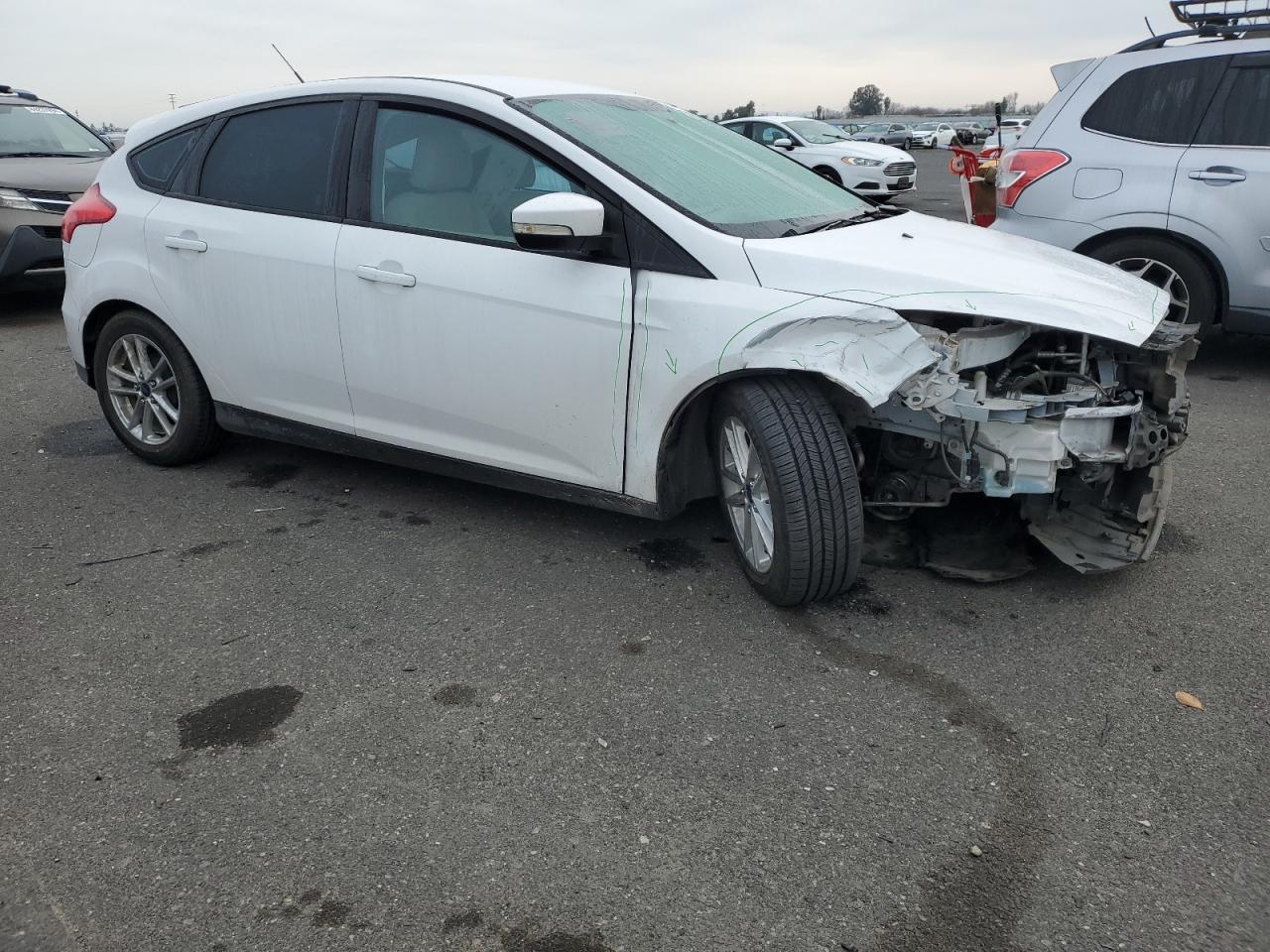 Photo 3 VIN: 1FADP3K26GL217810 - FORD FOCUS 