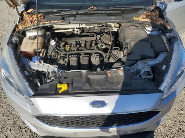 Photo 10 VIN: 1FADP3K26GL240018 - FORD FOCUS SE 