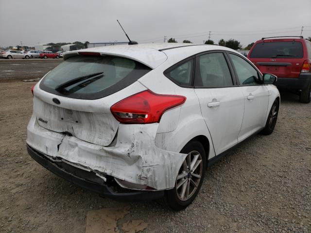 Photo 3 VIN: 1FADP3K26GL286559 - FORD FOCUS SE 