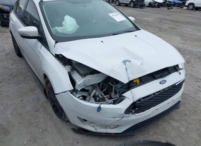 Photo 5 VIN: 1FADP3K26GL294788 - FORD FOCUS 