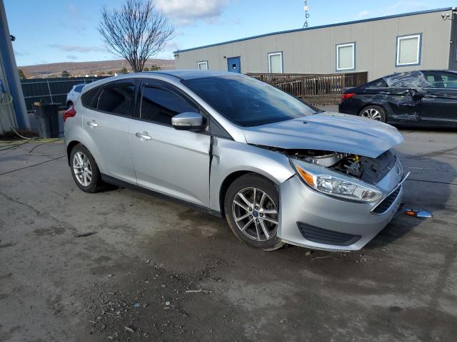 Photo 3 VIN: 1FADP3K26GL320225 - FORD FOCUS SE 