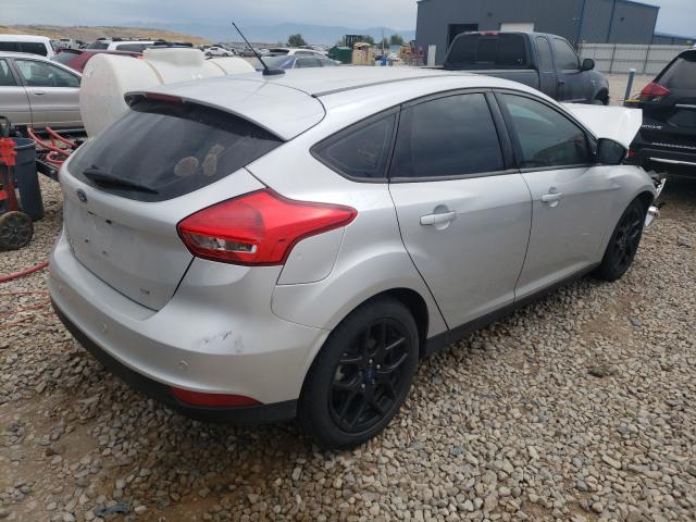 Photo 3 VIN: 1FADP3K26GL340636 - FORD FOCUS SE 