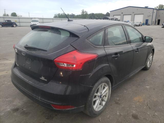 Photo 3 VIN: 1FADP3K26GL401662 - FORD FOCUS SE 