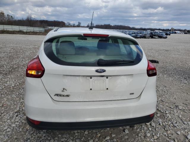 Photo 5 VIN: 1FADP3K26JL206586 - FORD FOCUS SE 