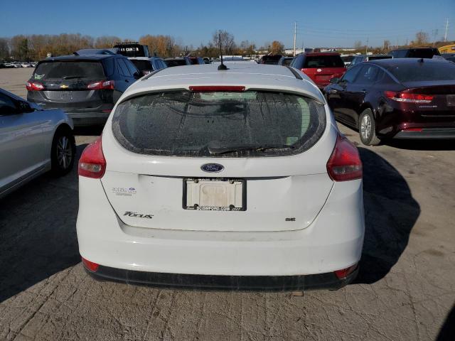 Photo 5 VIN: 1FADP3K26JL331037 - FORD FOCUS 