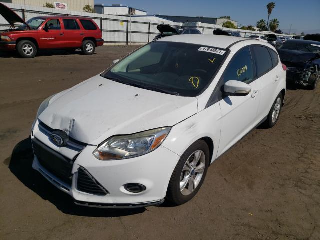 Photo 1 VIN: 1FADP3K27DL118991 - FORD FOCUS SE 