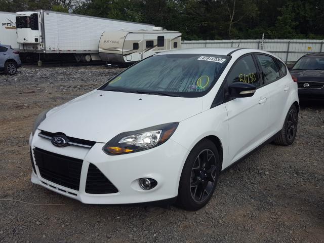 Photo 1 VIN: 1FADP3K27DL330614 - FORD FOCUS SE 