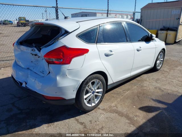 Photo 3 VIN: 1FADP3K27GL269771 - FORD FOCUS 