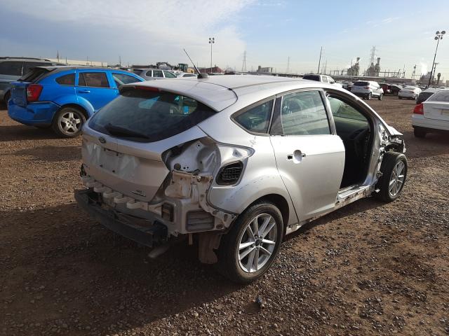 Photo 3 VIN: 1FADP3K27GL270628 - FORD FOCUS SE 