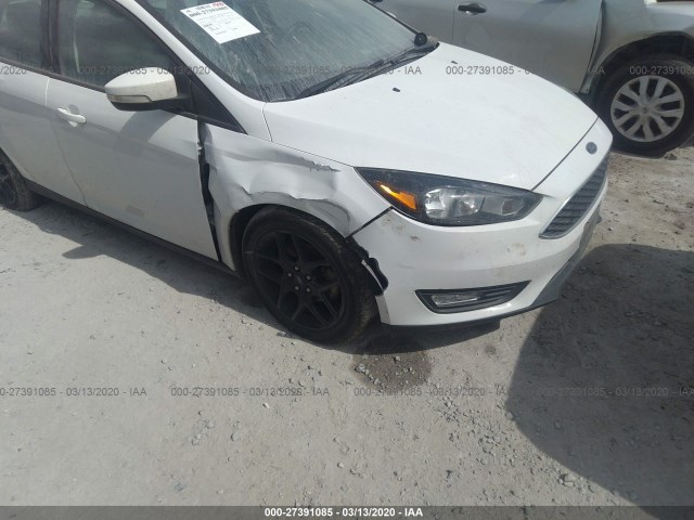 Photo 5 VIN: 1FADP3K27GL340645 - FORD FOCUS 