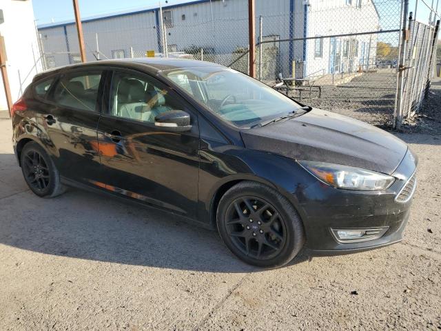 Photo 3 VIN: 1FADP3K27GL357199 - FORD FOCUS SE 