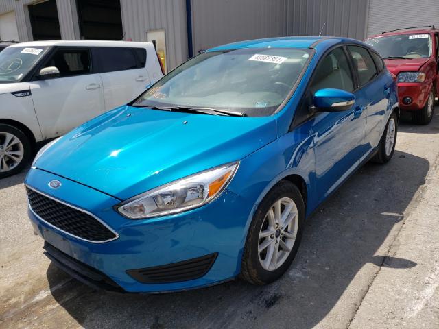 Photo 1 VIN: 1FADP3K27GL379560 - FORD FOCUS SE 