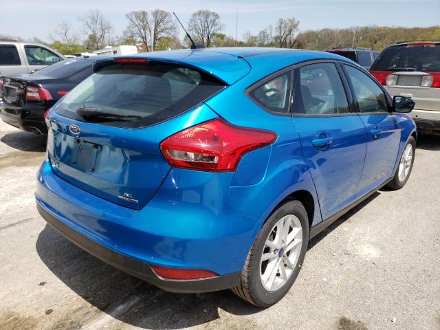 Photo 3 VIN: 1FADP3K27GL379560 - FORD FOCUS SE 