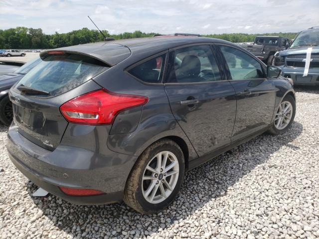 Photo 3 VIN: 1FADP3K27GL397198 - FORD FOCUS 