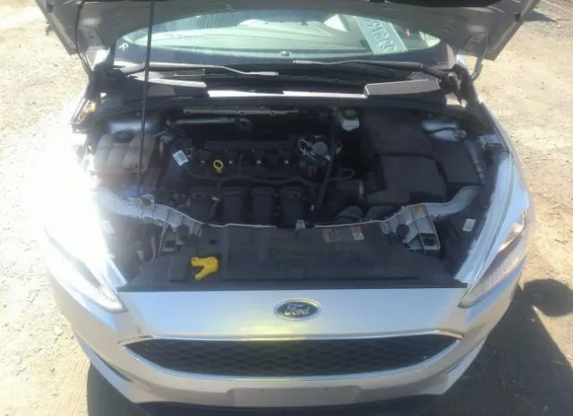 Photo 9 VIN: 1FADP3K27JL205950 - FORD FOCUS 