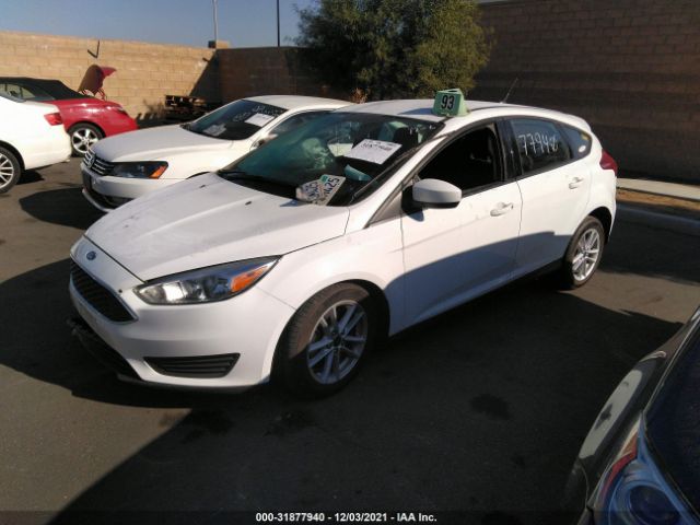 Photo 1 VIN: 1FADP3K27JL287663 - FORD FOCUS 