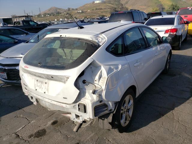 Photo 3 VIN: 1FADP3K28EL144503 - FORD FOCUS SE 