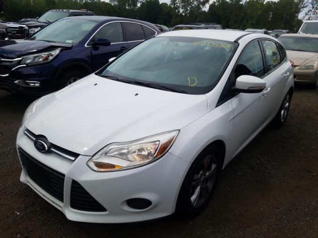 Photo 1 VIN: 1FADP3K28EL255424 - FORD FOCUS SE 