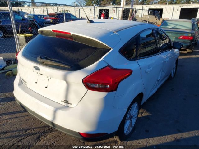 Photo 3 VIN: 1FADP3K28FL344881 - FORD FOCUS 