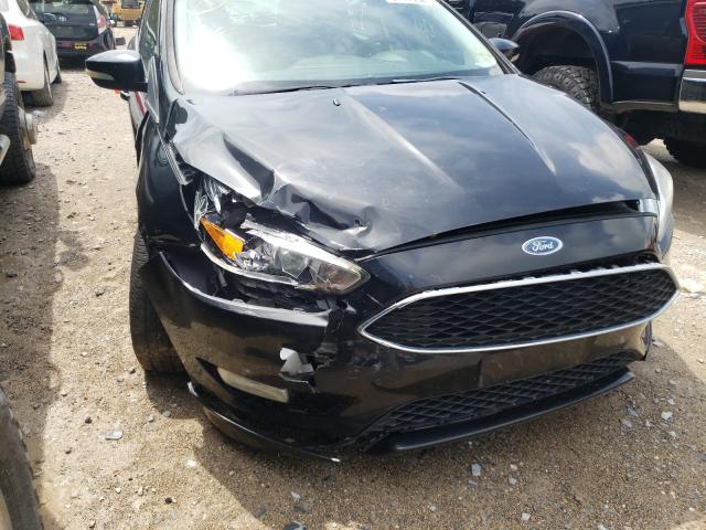 Photo 8 VIN: 1FADP3K28FL345450 - FORD FOCUS SE 