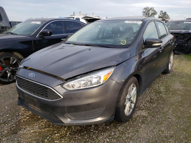 Photo 1 VIN: 1FADP3K28GL213984 - FORD FOCUS SE 