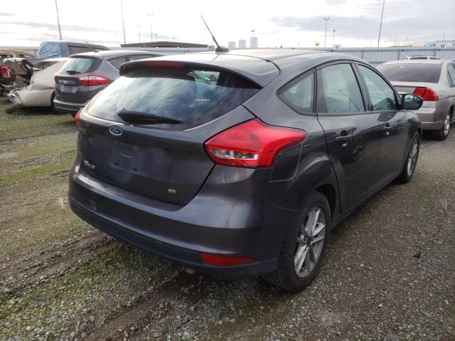 Photo 3 VIN: 1FADP3K28GL213984 - FORD FOCUS SE 