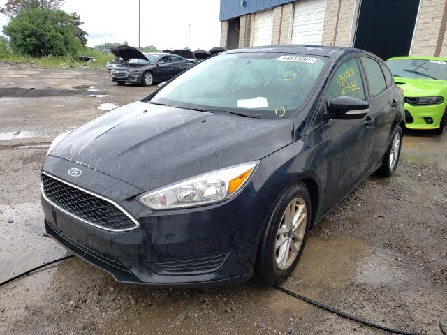 Photo 1 VIN: 1FADP3K28GL214133 - FORD FOCUS SE 